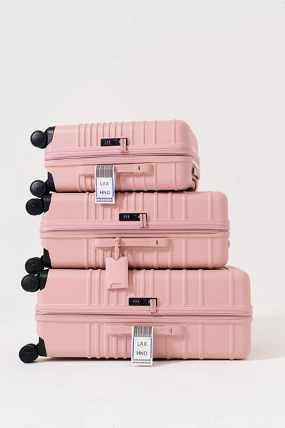 The Large Check-In Roller in Atlas Pink