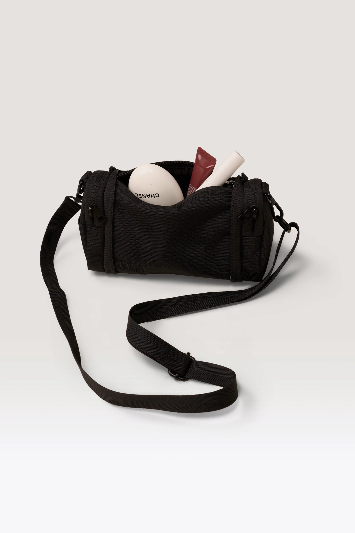 The Expandable Crossbody Charm in Black